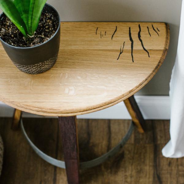 curved wine barrel side table showing reclaimed oak grain and engraved Finger Lakes